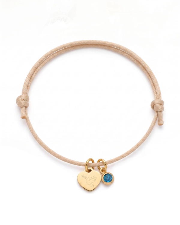 bransoletka na komunie z zawieszka serduszkiem grawerem gołębicy i cyrkonią.jpg